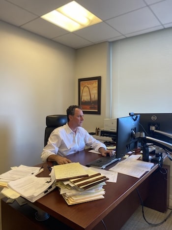 Attorney reviewing factors that may affect the value of a New York personal injury case.