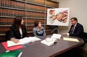 birth injury attorney discussing case with client