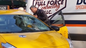 smashed windshield of the underinsured car